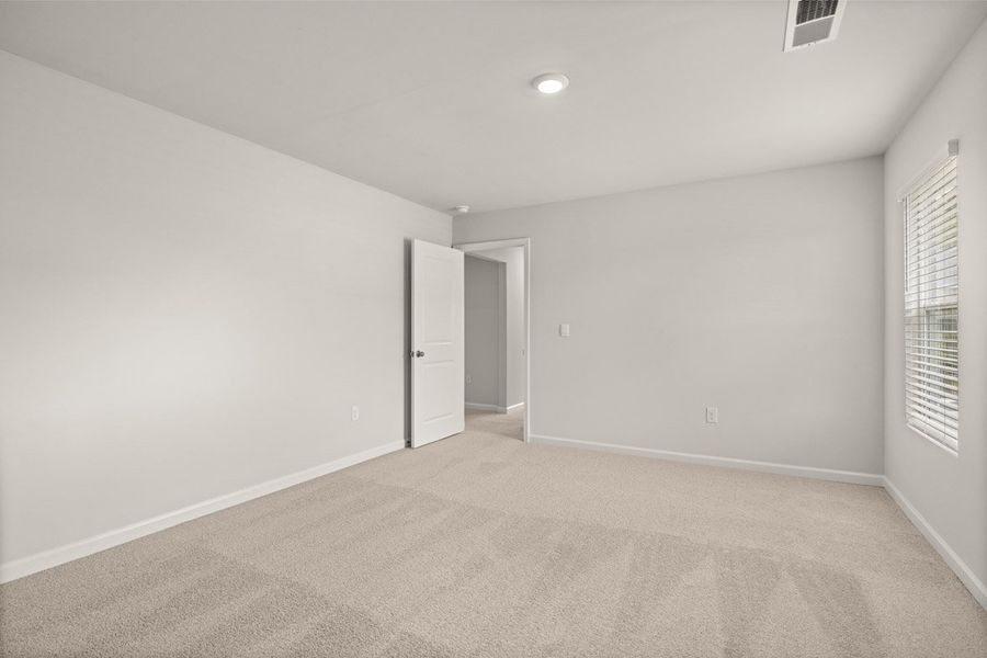 Representative unfurnished interior of a home built from the Mansfield by D.R. Horton in Southwind Village, Evans (Image 38).