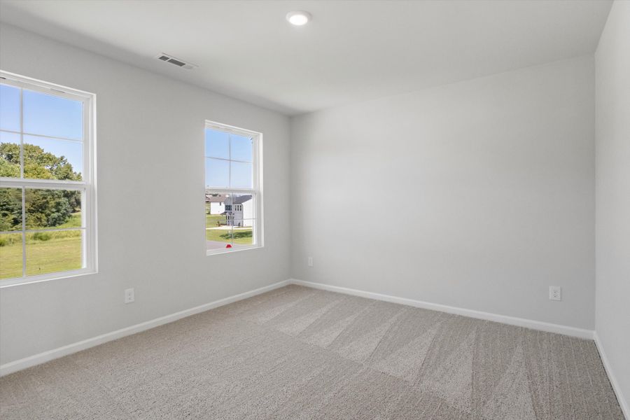 Spacious, unfurnished interior of a new home in Cambridge Reserve, Angier (Image 21).
