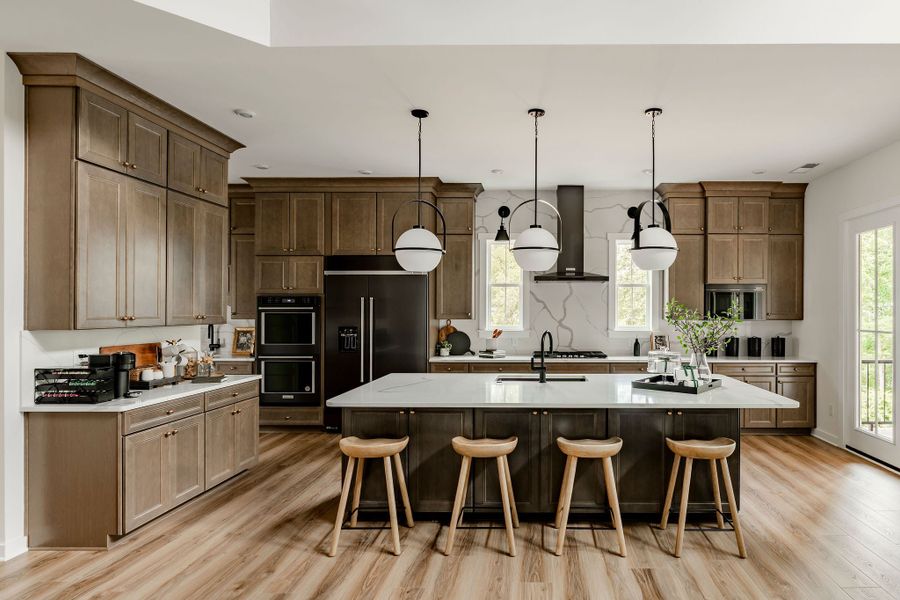 Representative furnished interior of a home built from the Nottingham by Keystone Custom Homes in McLean South Shore, Belmont (Image 5).
