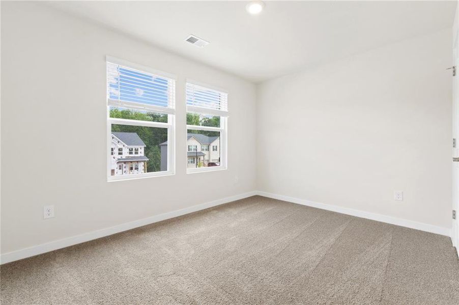 Spacious, unfurnished interior of a new home in Fern Dale, Fairburn (Image 21).
