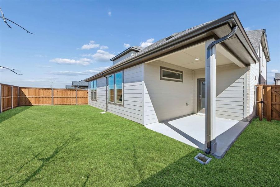 Covered Patio in the Wimbledon home plan by Trophy Signature Homes – REPRESENTATIVE PHOTO