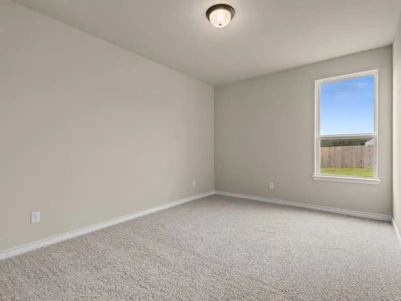 Spacious, unfurnished interior of a new home in The Reserve at Potranco Oaks, Castroville (Image 44).