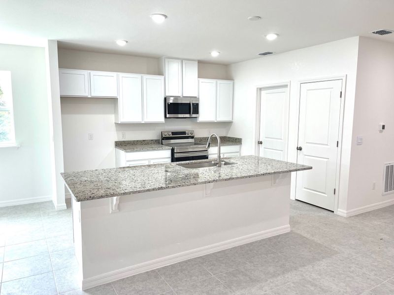 Furnished interior view inside a new home in Cape Coral, Cape Coral (Image 3). Furnished interior view inside a new home in Cape Coral, Cape Coral (Image 3).