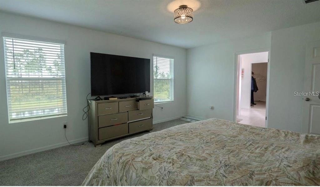 Furnished interior view inside a new home in Lake Deer Estates - Signature Series, Poinciana (Image 5).