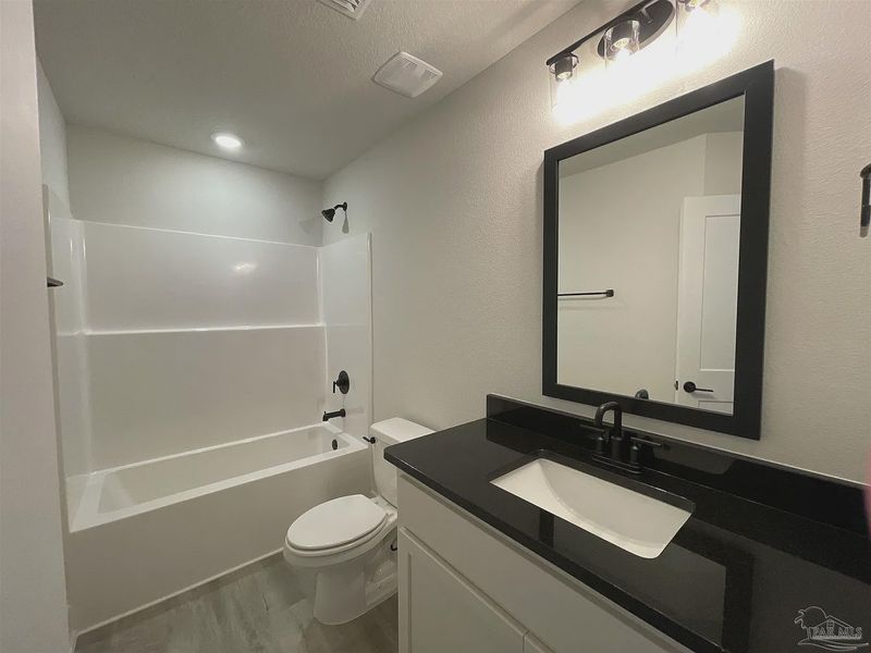Furnished interior view inside a new home in Turtle Creek, Cantonment (Image 6).