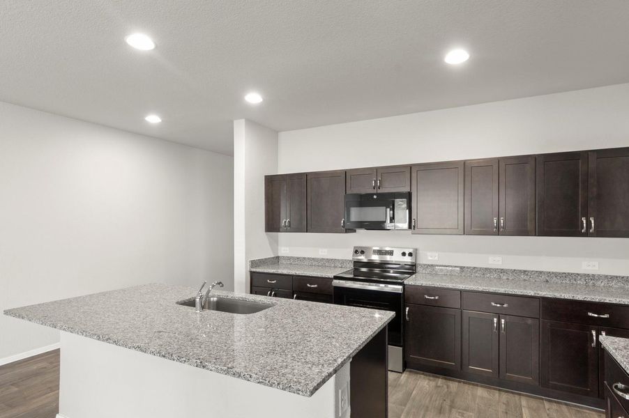 Furnished interior view inside a new home in Oaks at San Gabriel, Georgetown (Image 14).