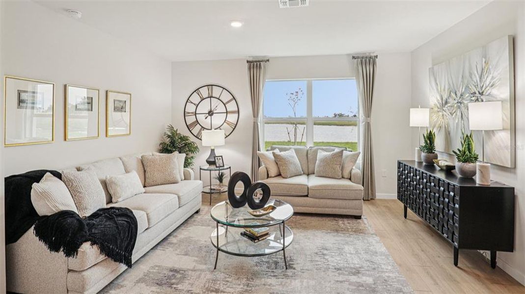 Furnished interior view inside a new home in Seagrass - Express & Tradition, Punta Gorda (Image 4). Furnished interior view inside a new home in Seagrass - Express & Tradition, Punta Gorda (Image 4).
