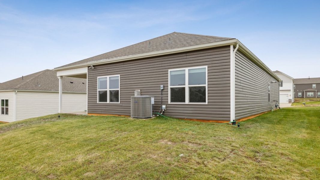 Exterior details and patio area of a home in Millstone Village, Morristown (Image 2).