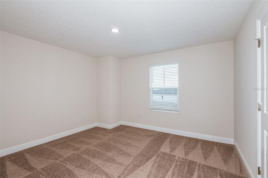 Spacious, unfurnished interior of a new home in Pasadena Landing, Wesley Chapel (Image 16).