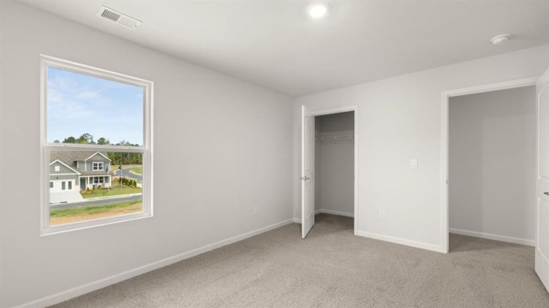 Spacious, unfurnished interior of a new home in Fairway 17 at Mirror Lake, Villa Rica (Image 32).