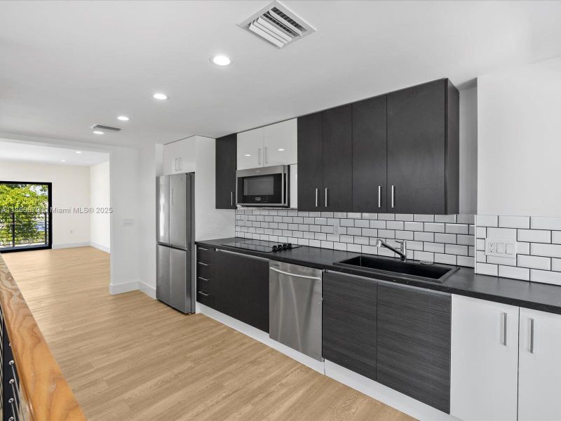 Furnished interior view inside a new home in , Miami Beach (Image 8). Furnished interior view inside a new home in , Miami Beach (Image 8).