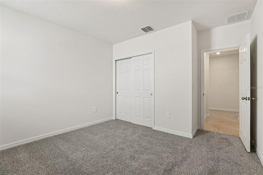 Spacious, unfurnished interior of a new home in Lawson Dunes - Signature Series, Haines City (Image 28). Spacious, unfurnished interior of a new home in Lawson Dunes - Signature Series, Haines City (Image 28).