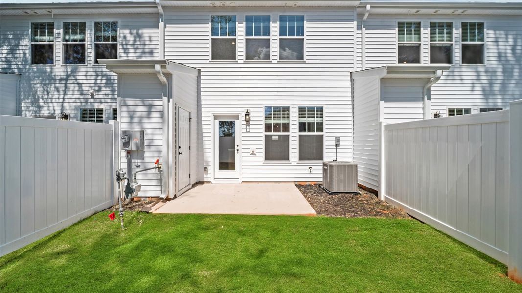Front exterior of a new home in Hickory Heights, Greenville, SC, highlighting curb appeal (Image 20). Front exterior of a new home in Hickory Heights, Greenville, SC, highlighting curb appeal (Image 20).