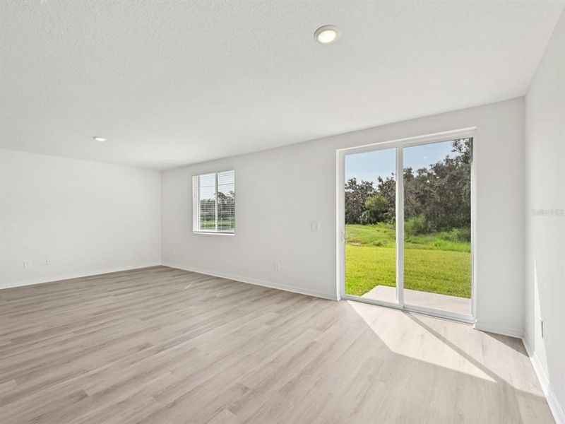 Spacious, unfurnished interior of a new home in The Reserve at Van Oaks, Auburndale (Image 7).