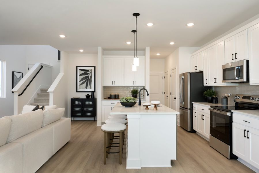 Representative furnished interior of a home built from the Amy by Risewell Homes in Freedom at Anthem, Mountain City (Image 3).