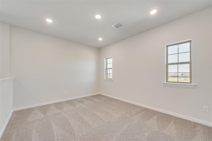 Spacious, unfurnished interior of a new home in Spiritas Ranch, Little Elm (Image 24).