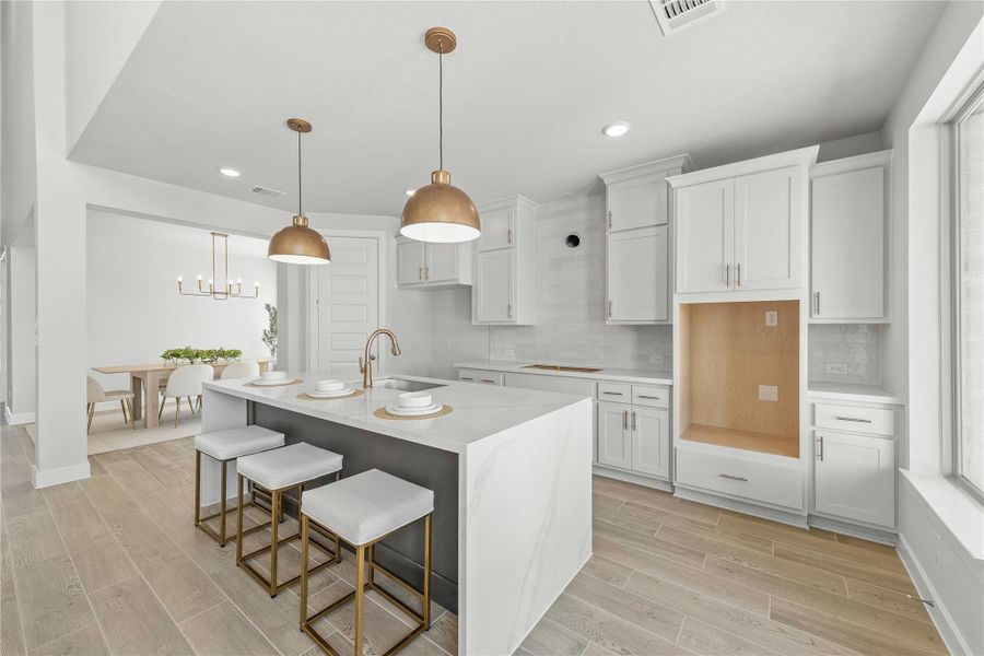 Furnished interior view inside a new home in Sunterra, Katy (Image 15).