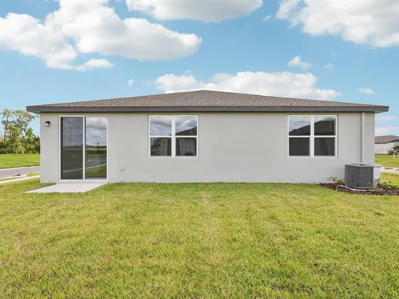 Exterior details and patio area of a home in The Reserve at Van Oaks, Auburndale (Image 3). Exterior details and patio area of a home in The Reserve at Van Oaks, Auburndale (Image 3).