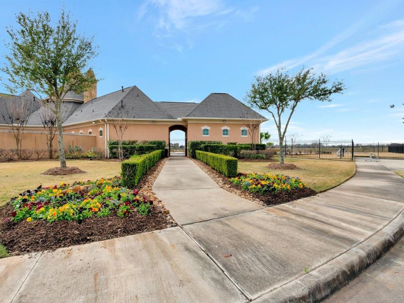 Front exterior of a new home in Kingdom Heights, Rosenberg, TX, highlighting curb appeal (Image 18). Front exterior of a new home in Kingdom Heights, Rosenberg, TX, highlighting curb appeal (Image 18).