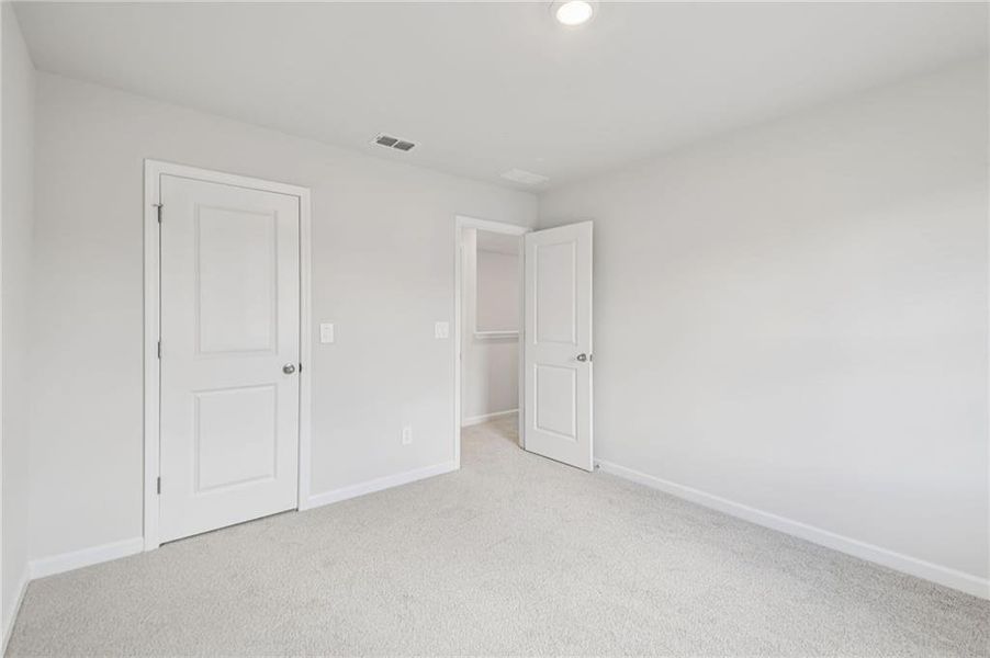 Spacious, unfurnished interior of a new home in Creekside at Oxford Park, Fairburn (Image 27).