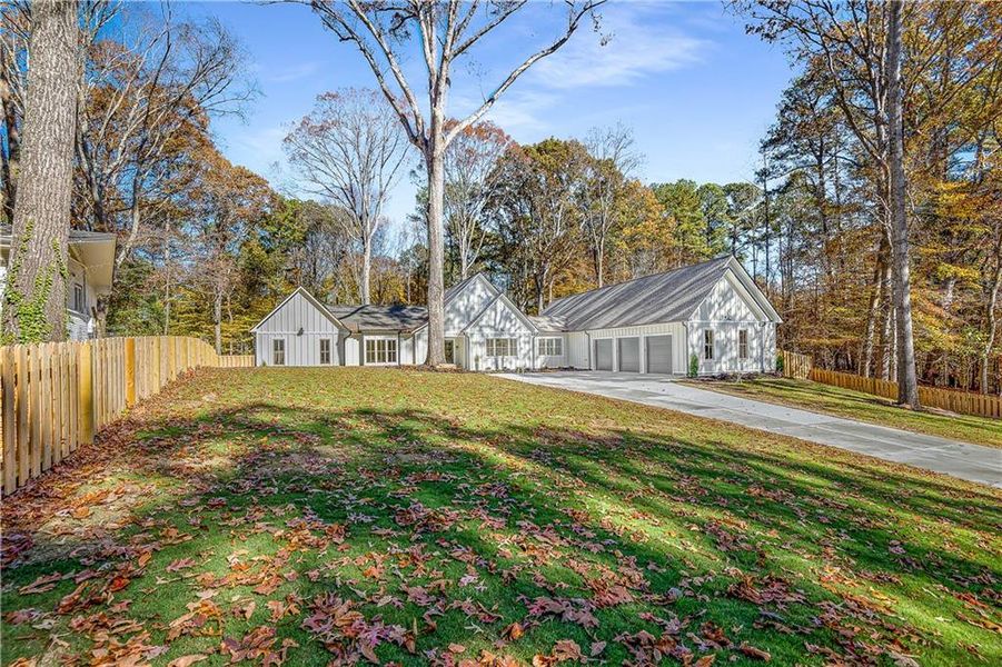 Front exterior of a new home in , Tucker, GA, highlighting curb appeal (Image 29).