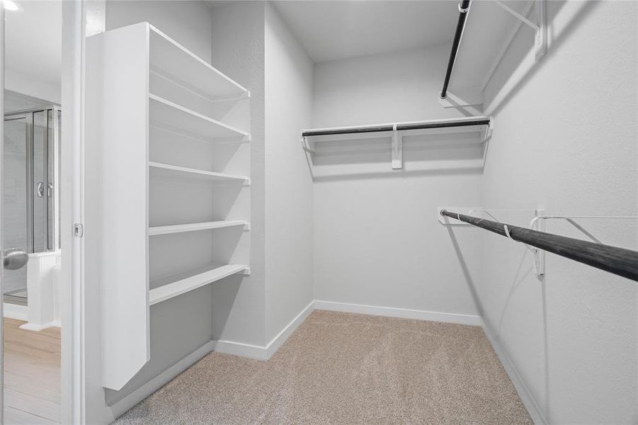 Look at this immaculate closet! With high shelving, multiple rows to hang clothing, you are sure to have enough room for all your belongings!