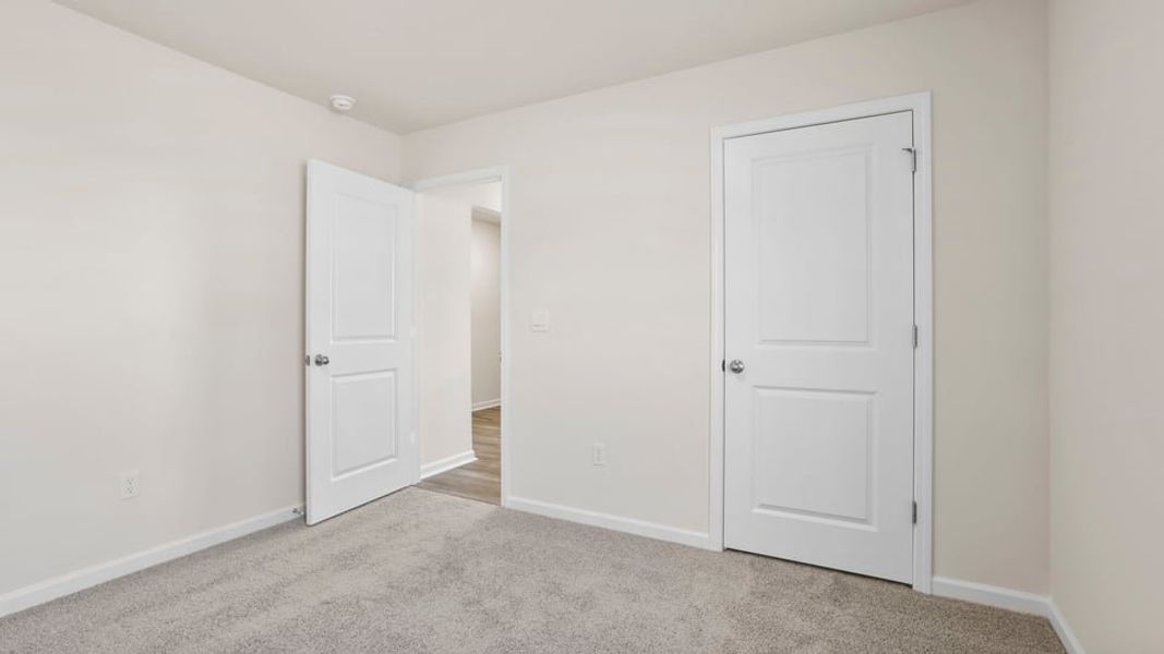 Spacious, unfurnished interior of a new home in Cedar Gap, Fountain Inn (Image 19). Spacious, unfurnished interior of a new home in Cedar Gap, Fountain Inn (Image 19).