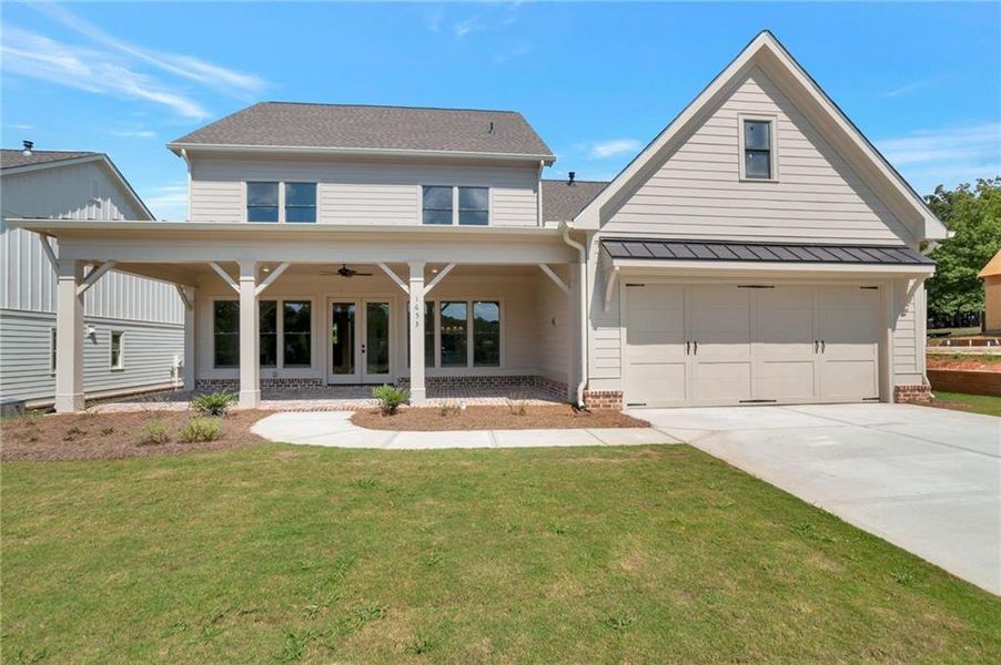 Front exterior of a new home in , Statham, GA, highlighting curb appeal (Image 2).