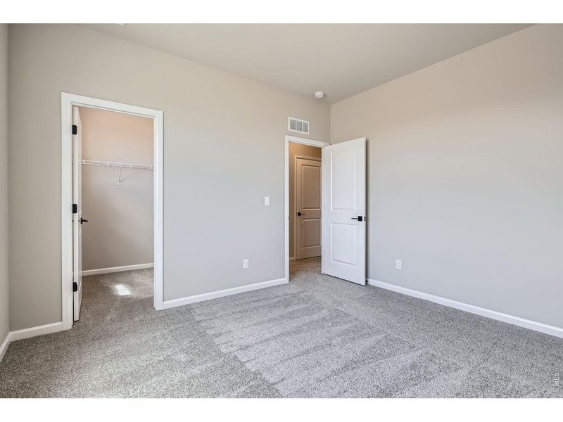 Spacious, unfurnished interior of a new home in Farmstead, Berthoud (Image 43).