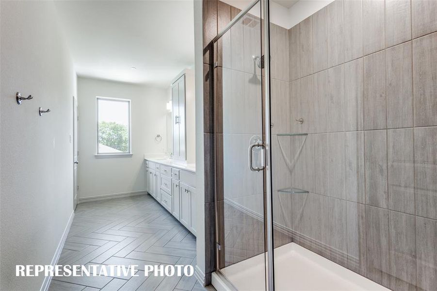 Your new owner's bath comes complete with an oversized, walk in shower.  REPRESENTATIVE PHOTO