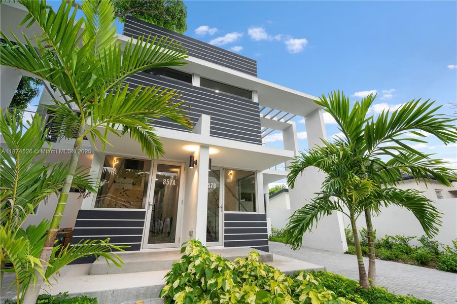 Front exterior of a new home in , Miami, FL, highlighting curb appeal (Image 25).