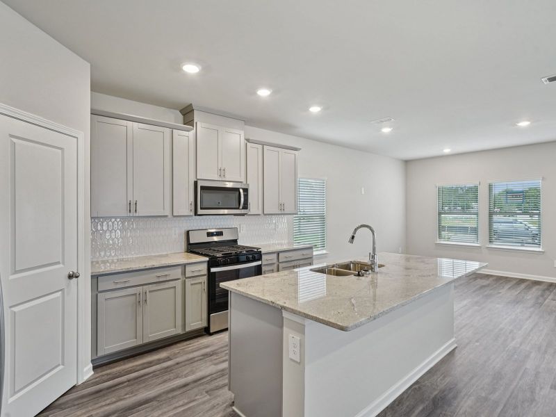 Kitchen in the Thompson floorplan at a Meritage Homes community in Atlanta, GA.