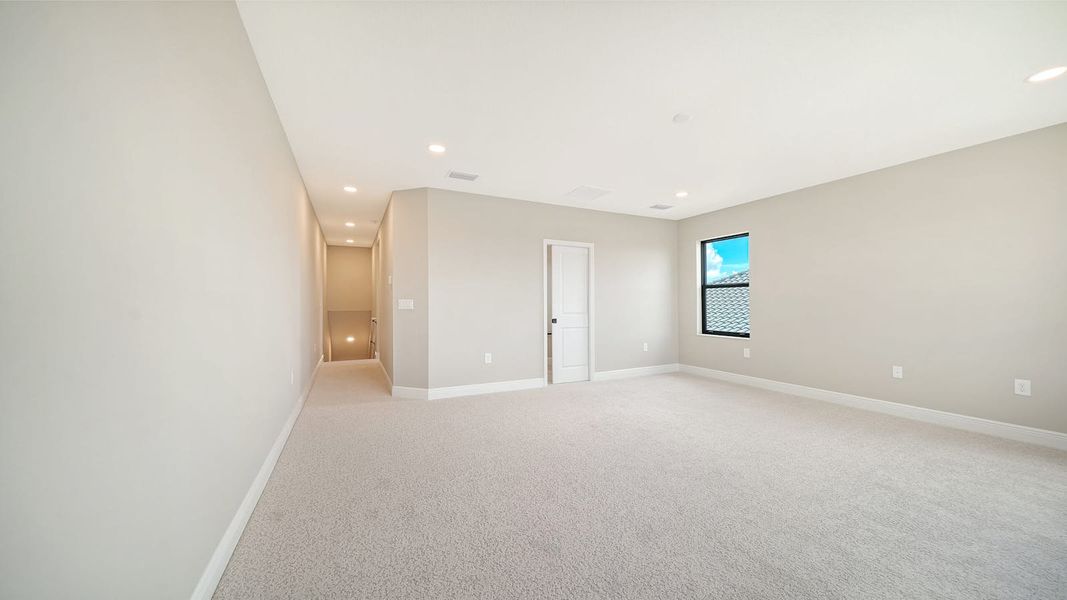 Spacious, unfurnished interior of a new home in Windward Real Estate and Homes for Sale in Sarasota, FL - Neal Communities, Lakewood Ranch (Image 49).