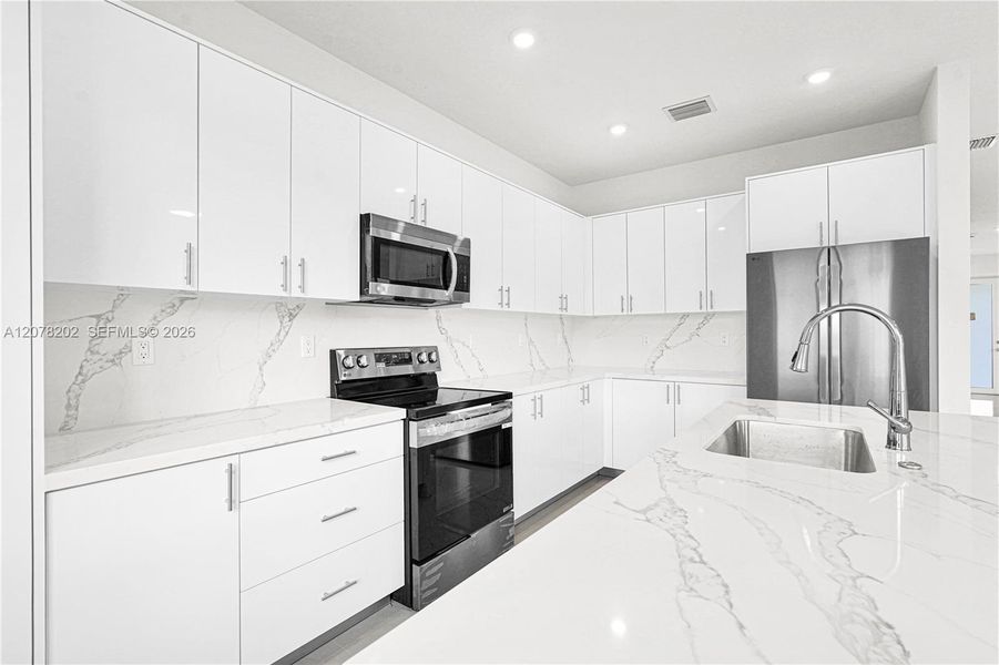 Furnished interior view inside a new home in Chloe's Estates, Miami (Image 15).