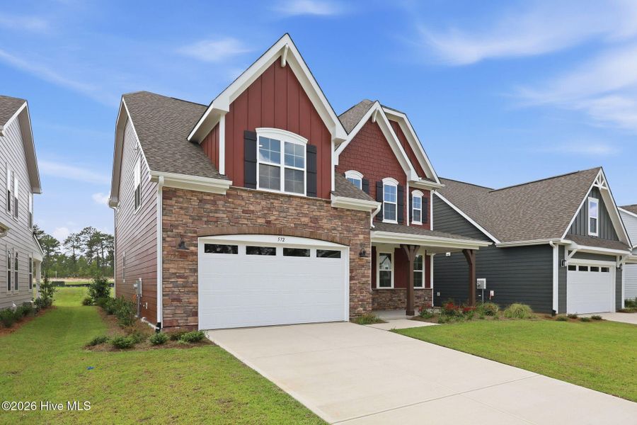 Front exterior of a new home in Legacy Lakes, Aberdeen, NC, highlighting curb appeal (Image 24).