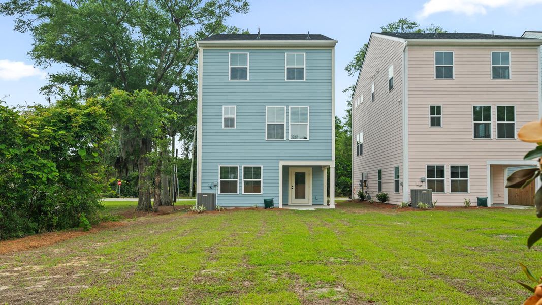 Exterior details and patio area of a home in Park Circle Single Family Homes, North Charleston (Image 3).