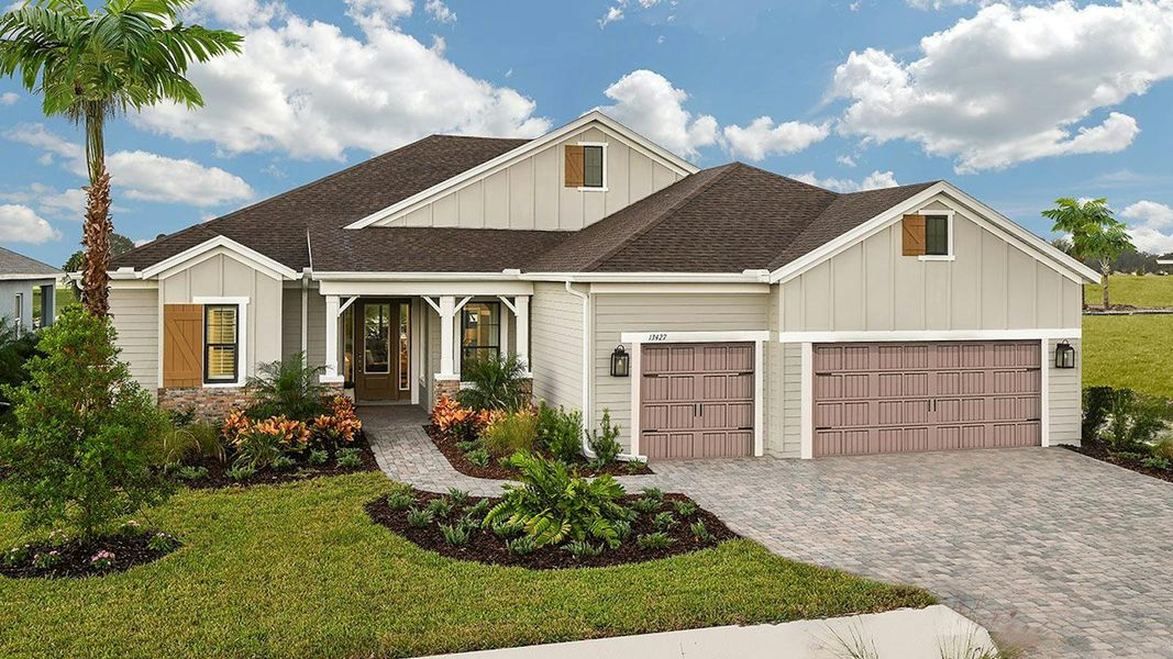 Front exterior of a new home in Canoe Creek Real Estate and Homes for Sale in Parrish, FL - Neal Communities, Parrish, FL, highlighting curb appeal (Image 2). Front exterior of a new home in Canoe Creek Real Estate and Homes for Sale in Parrish, FL - Neal Communities, Parrish, FL, highlighting curb appeal (Image 2).