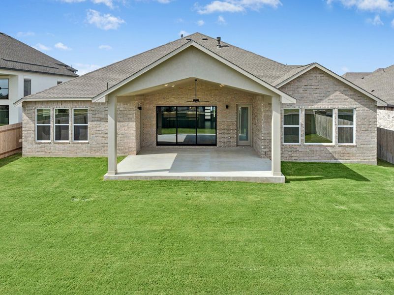 Exterior details and patio area of a home in Santa Rita Ranch, Liberty Hill (Image 26).