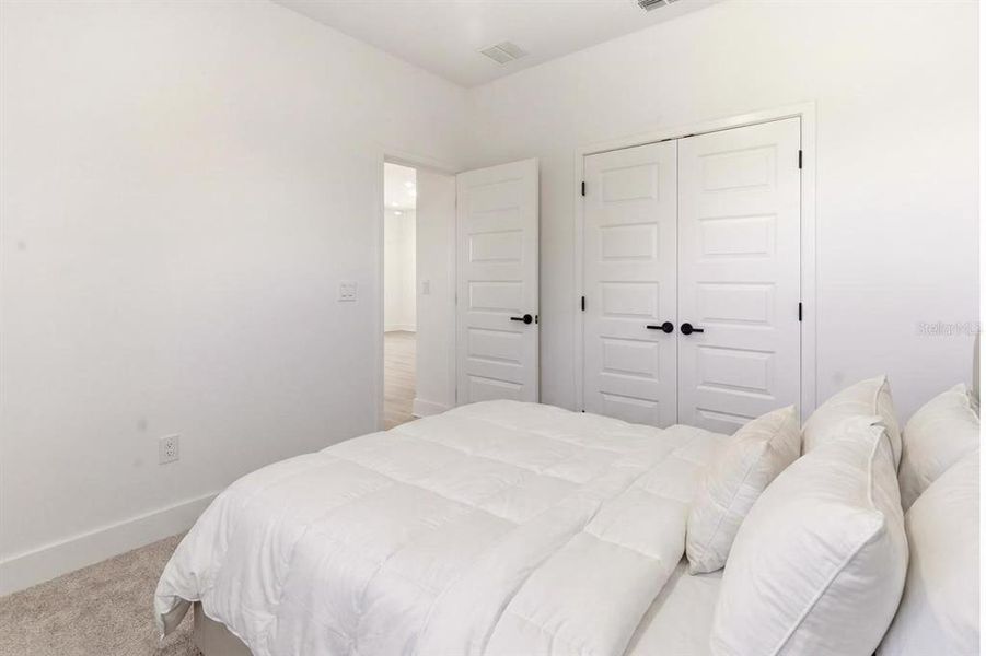 Furnished interior view inside a new home in , Winter Garden (Image 40).