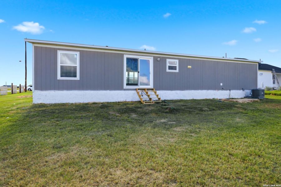 Exterior details and patio area of a home in , Atascosa (Image 20).