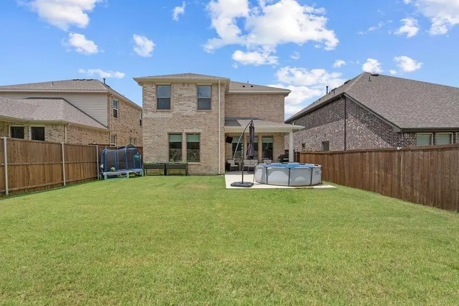 Exterior details and patio area of a home in Devonshire, Forney (Image 2). Exterior details and patio area of a home in Devonshire, Forney (Image 2).