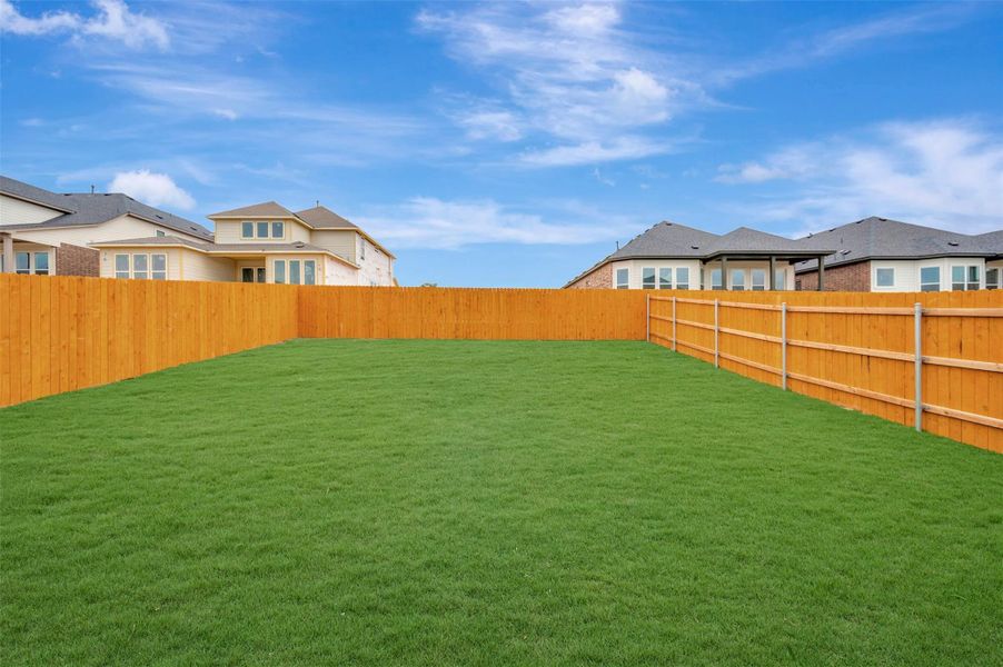 Exterior details and patio area of a home in Heritage, Dripping Springs (Image 3).
