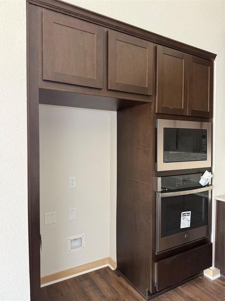 Built in oven and microwave. Still under construction, please pardon the mess.