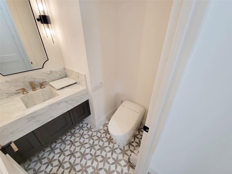 Powder room with Marble floor and countertop
