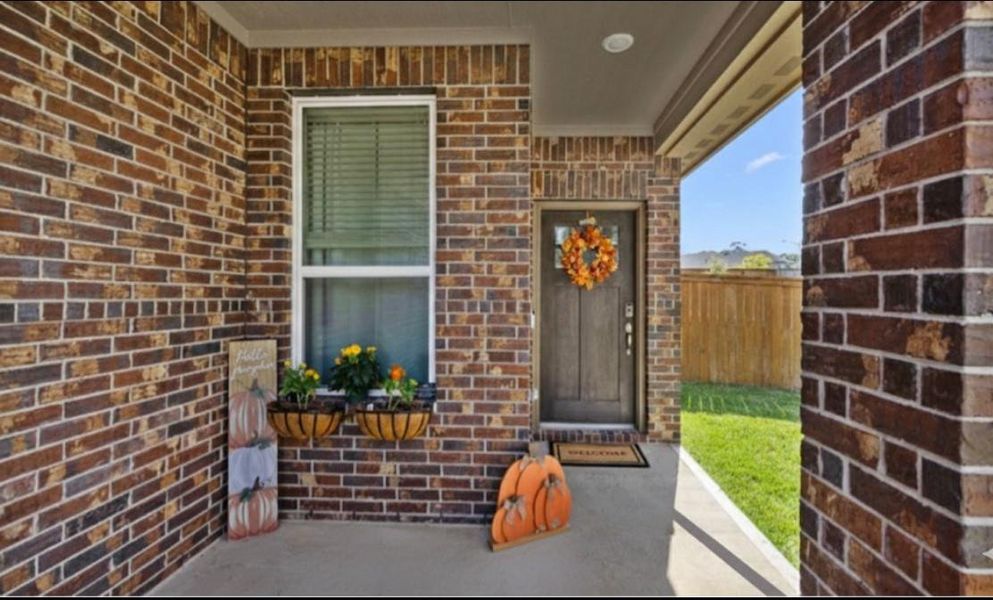 Whether decorated for the seasons or enjoyed as a quiet spot to sip your morning coffee, this porch offers both character and comfort!
