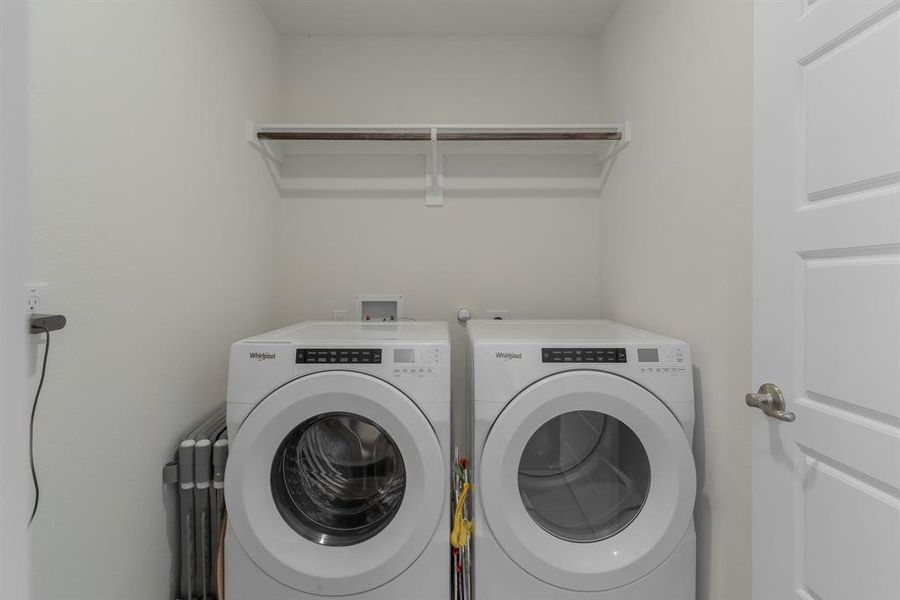 Laundry area with laundry area and washing machine and dryer