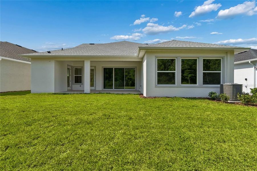 Exterior details and patio area of a home in Chapel Crossings – Classic Series, Wesley Chapel (Image 3).