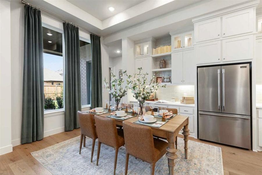 Furnished interior view inside a new home in Estates at Bristol Valley, Heath (Image 15).