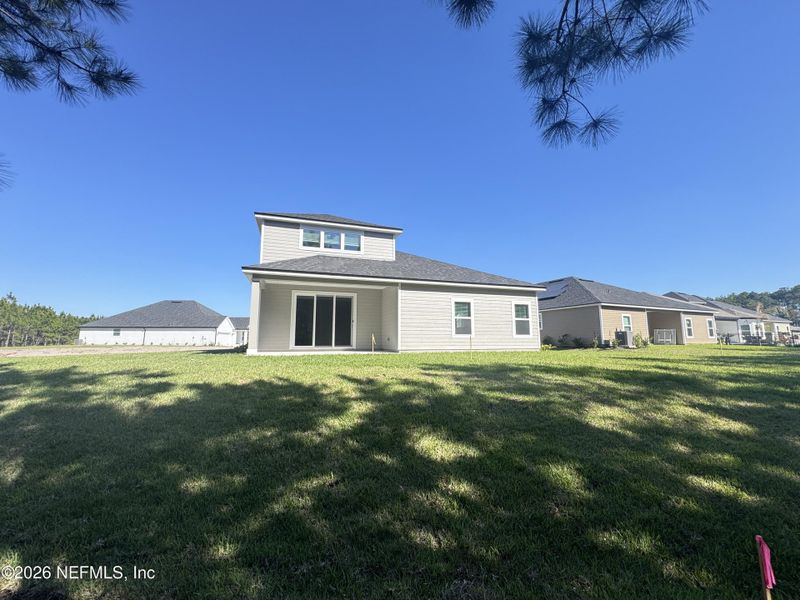 Exterior details and patio area of a home in Hyland Trail, Green Cove Springs (Image 4).