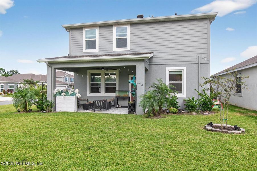 Exterior details and patio area of a home in Sawmill Creek at Palm Coast Park, Palm Coast (Image 27).